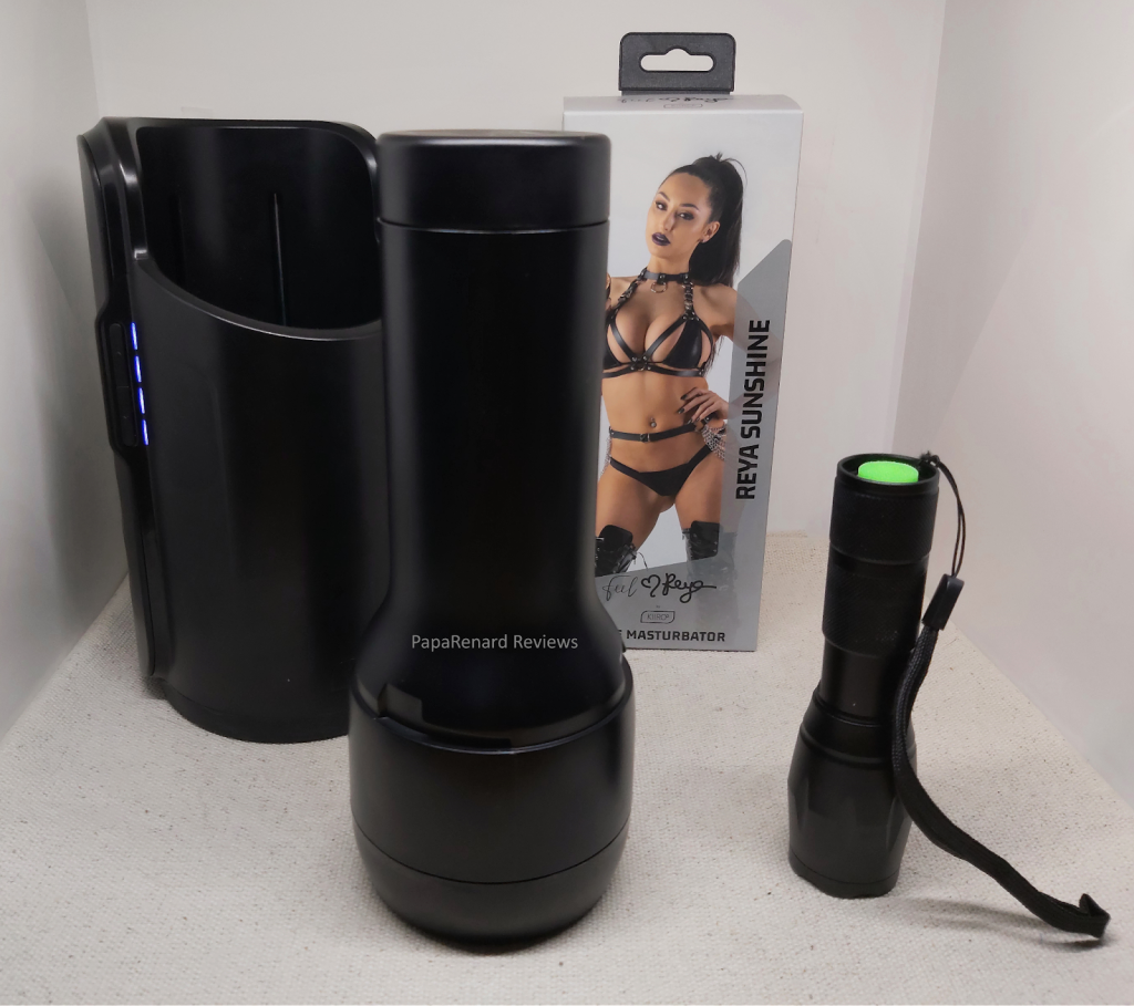 FeelReya next to a flashlight and in front of the Keon