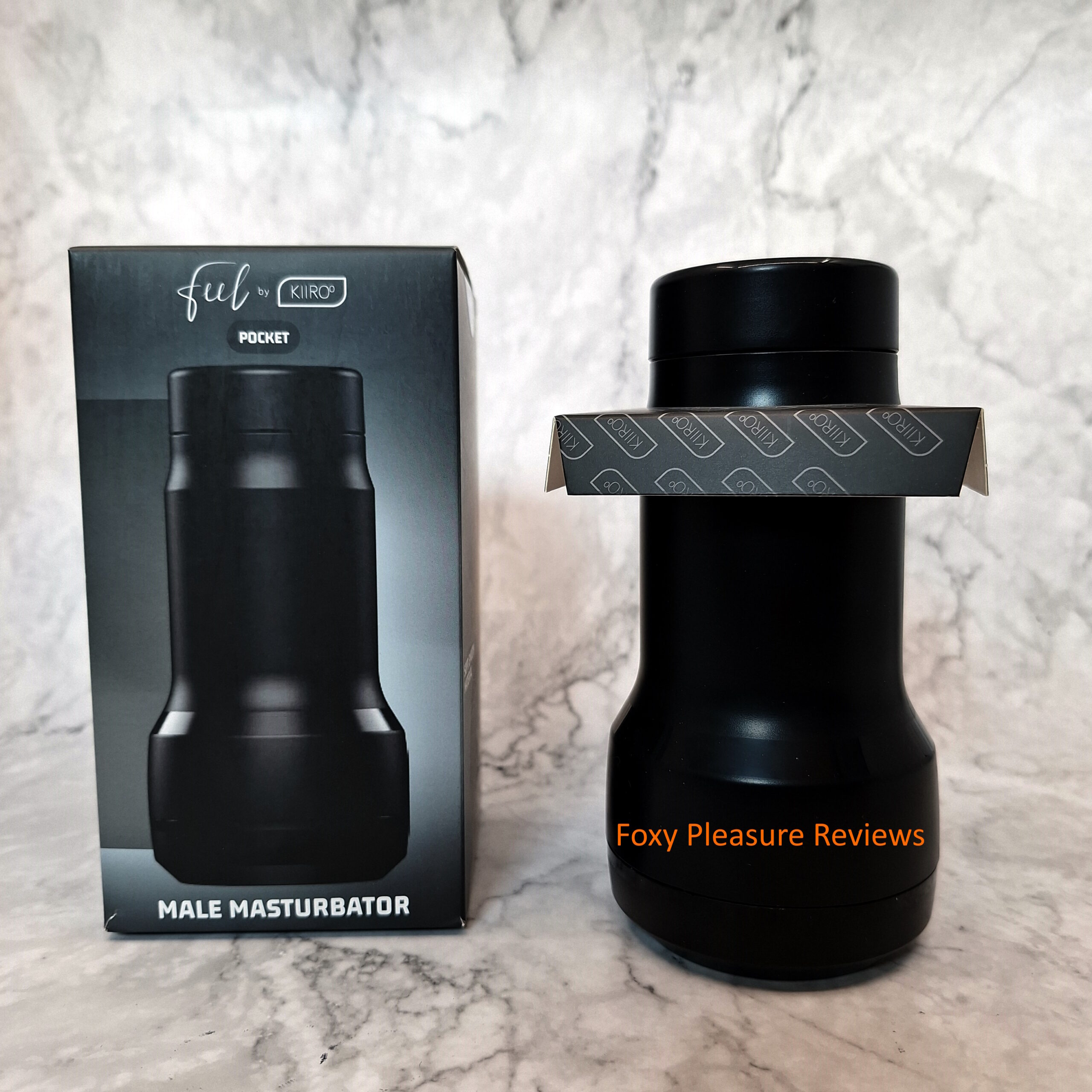 FeelPocket outside of its package. The usual piece of cardboard used to hold the case in position in the packaging is not screwed onto the top cap.