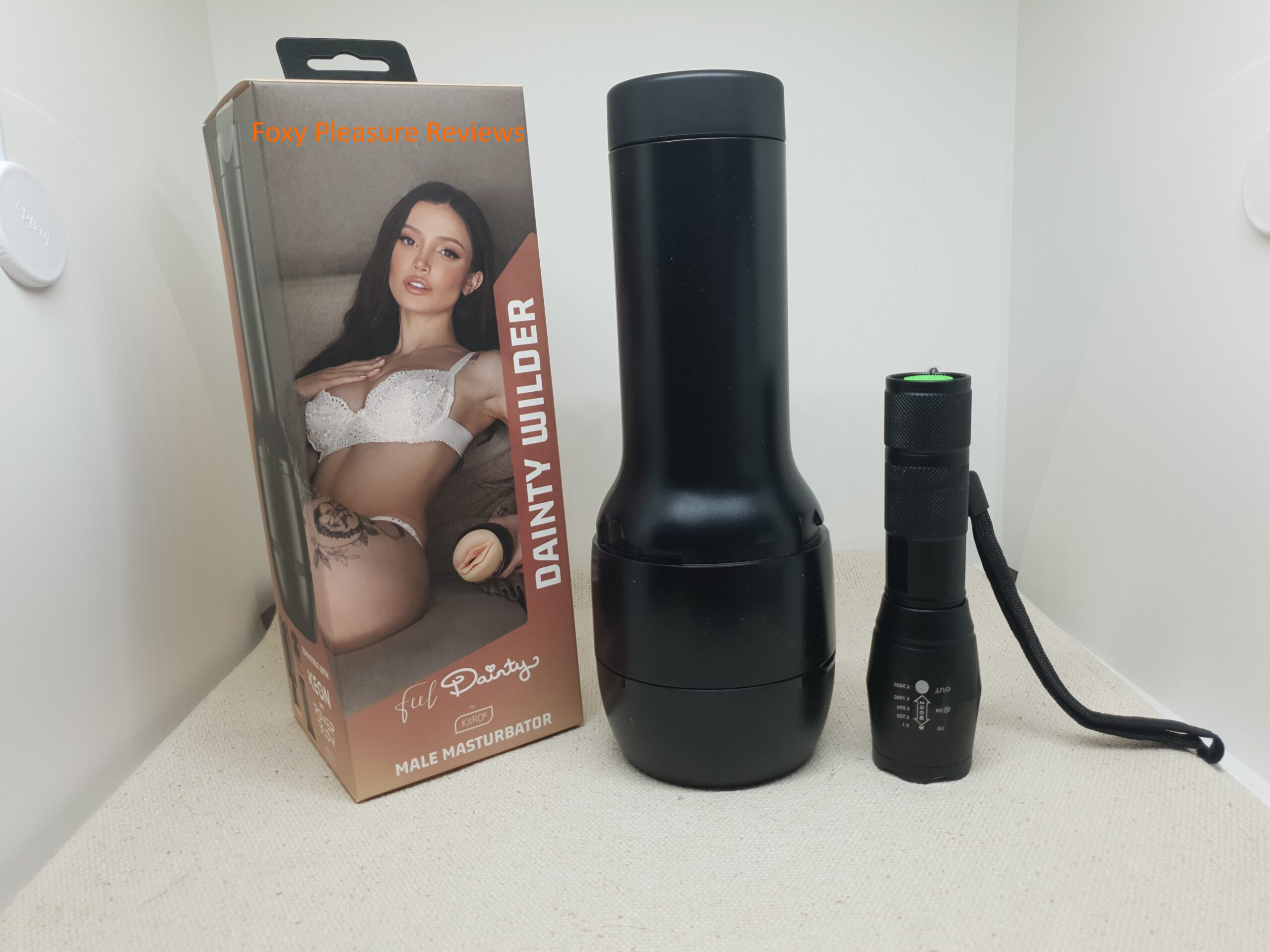 FeelDainty next to a flashlight