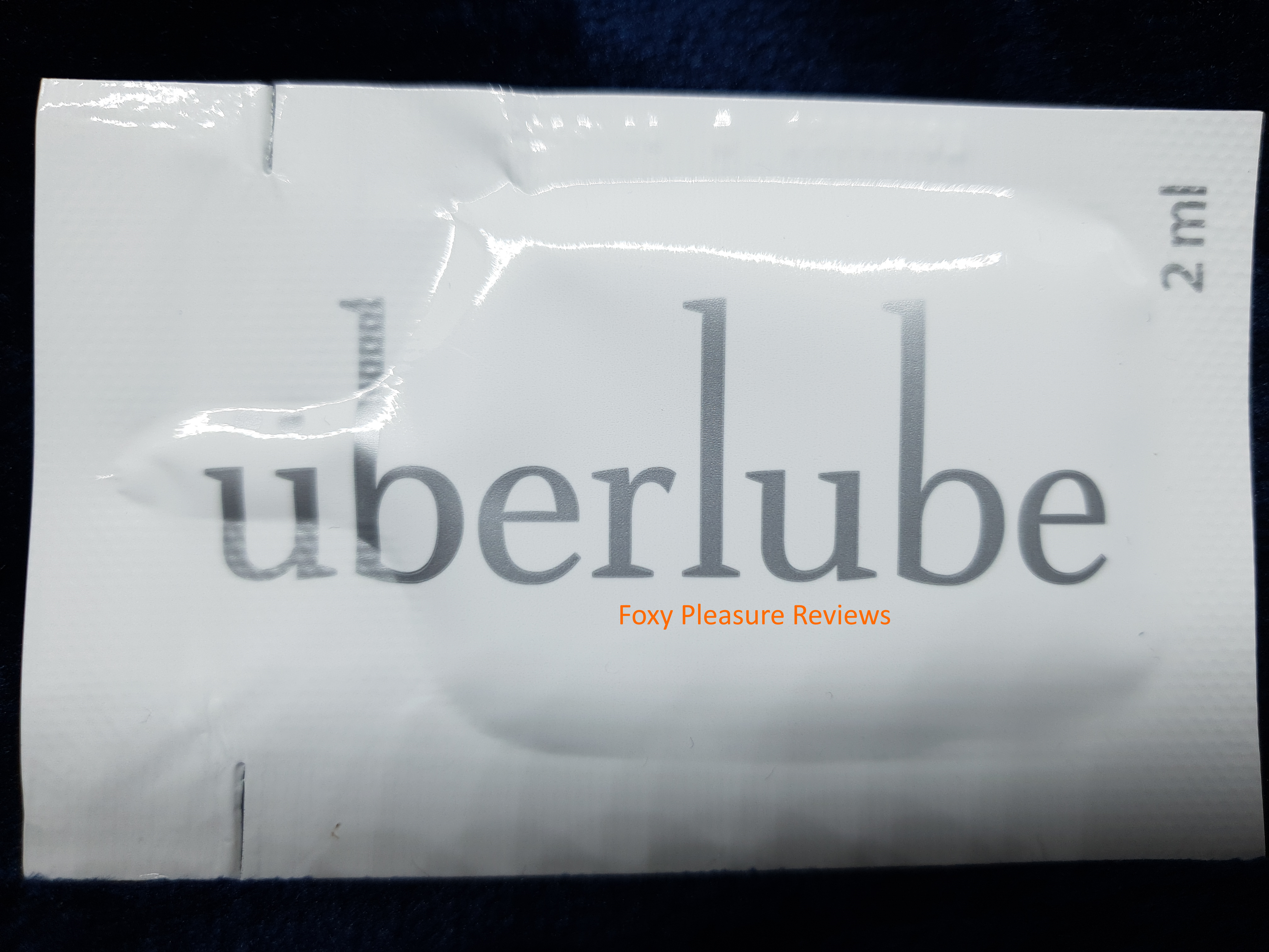 Front view of a 2mL unidose of Überlube